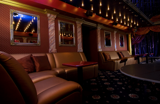 Comfortable sofas in a lounge area of night club